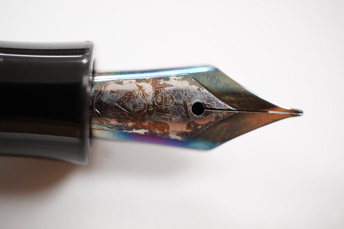 A Montblanc button fill fountain pen in brown which appears to be a 136 although worn from blind cap